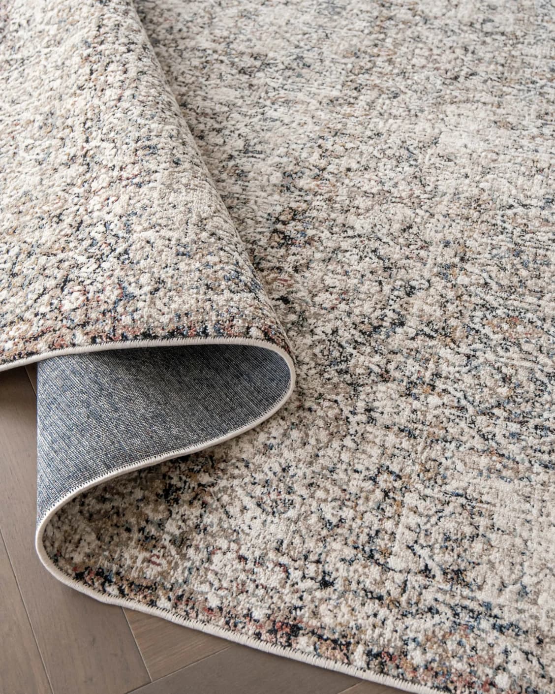 Sheldon Ebony carpet in black and beige, shown in a product close-up as image 11