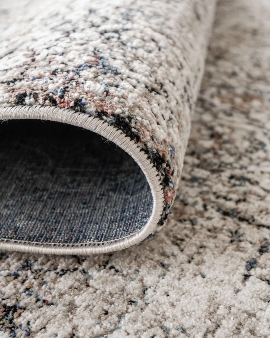 Sheldon Ebony carpet in black and beige, shown in a product close-up as image 12