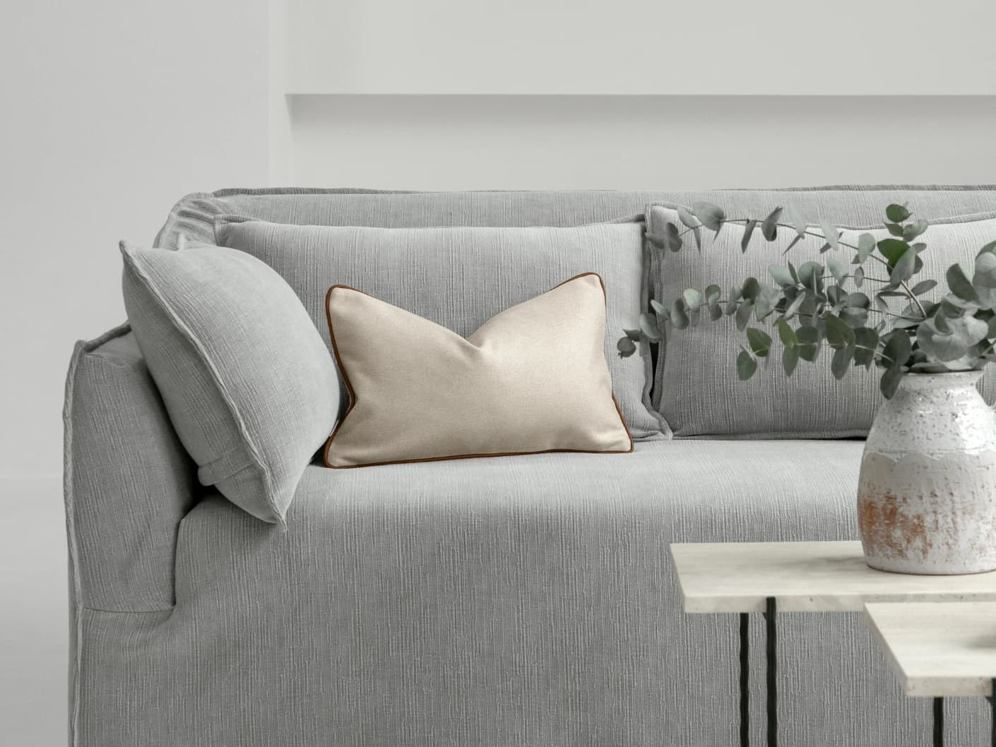 Silvie Klimt II single cushions in cream, shown in a lifestyle front view