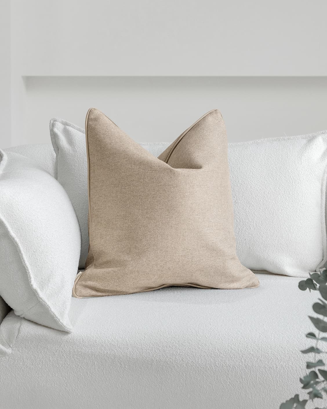 Silvie Laurent cushion in taupe, shown in a lifestyle front view as image 2