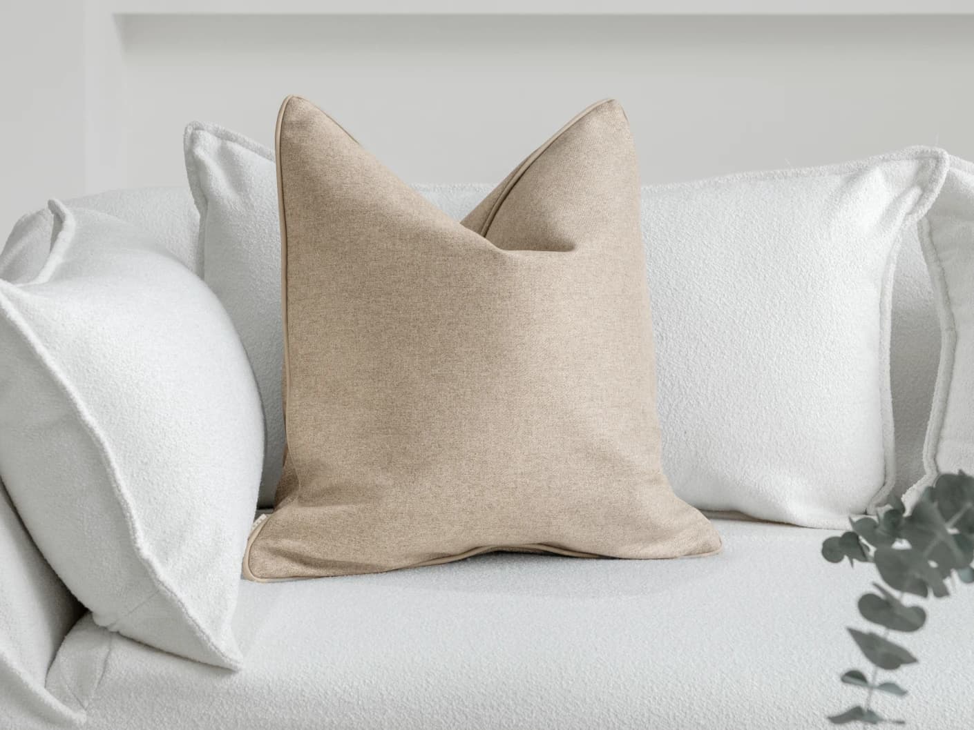 Silvie Laurent single cushions in taupe, shown in a lifestyle front view