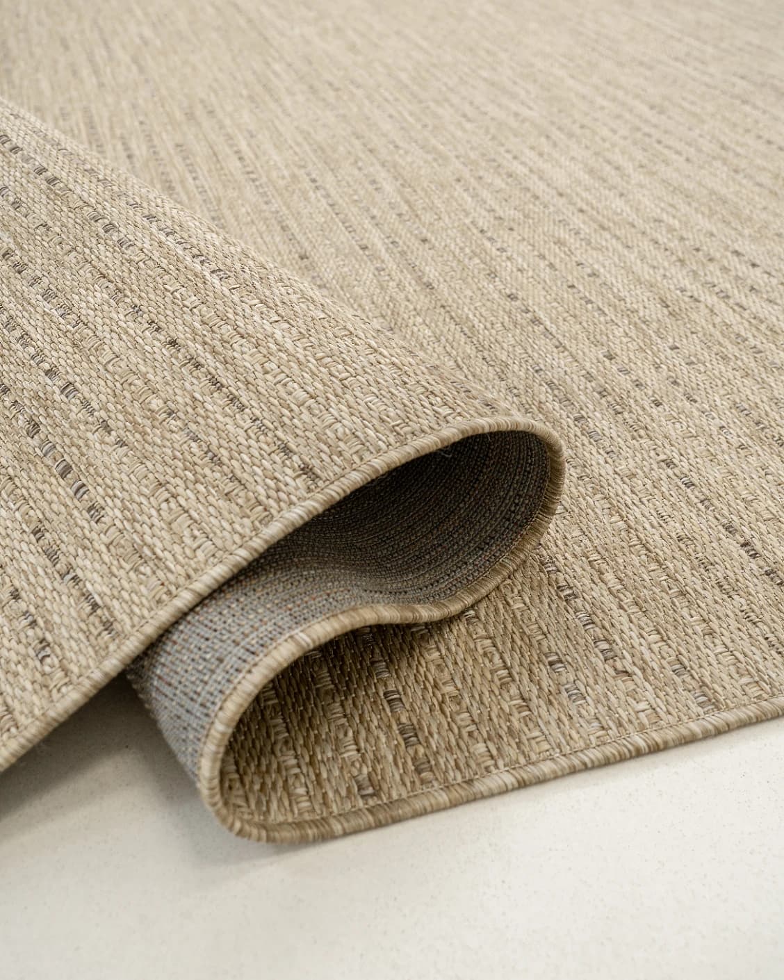 Solana Sandy carpets in brown, shown in a product close-up as image 1