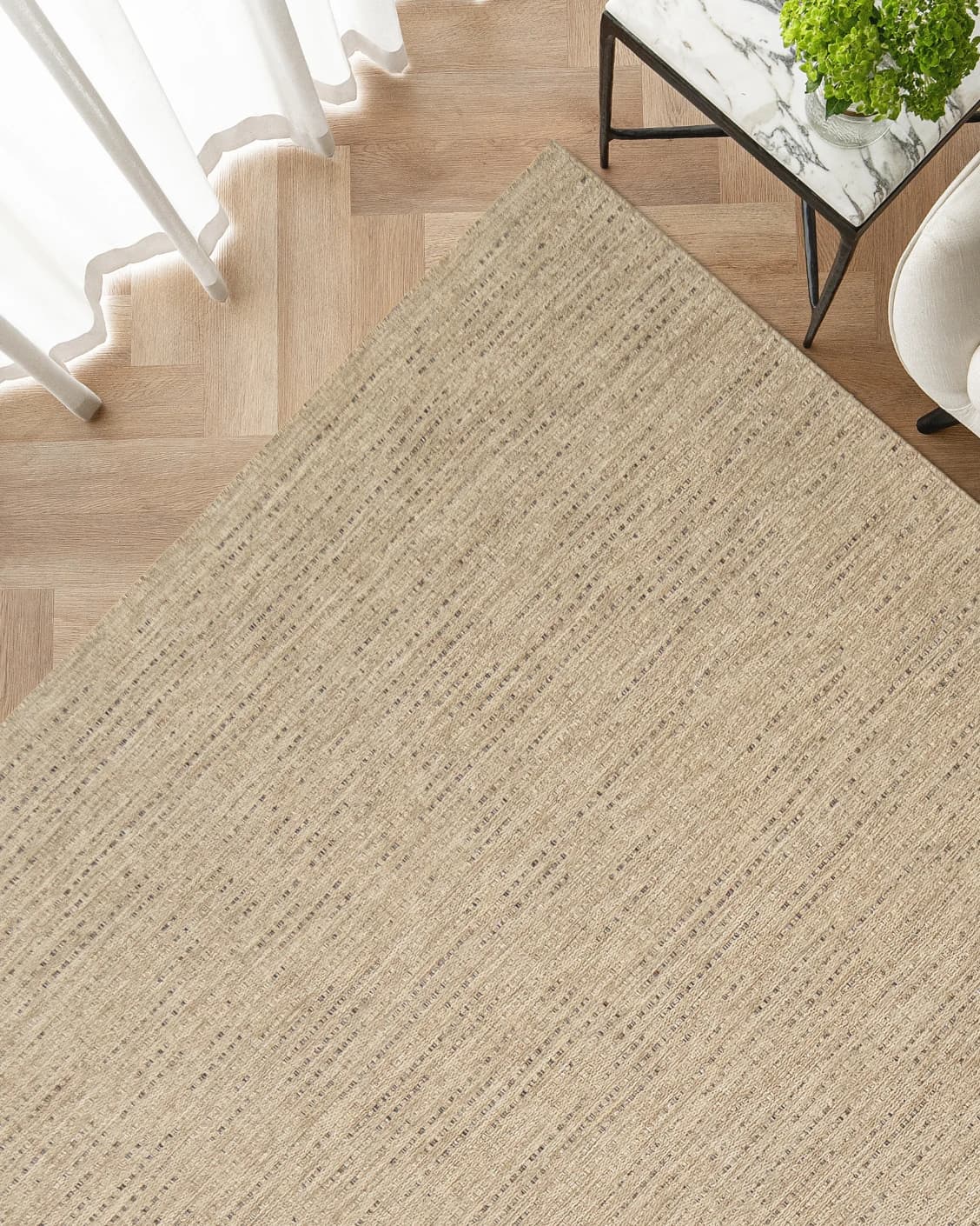 Solana Sandy carpet in sandy and brown, shown in a lifestyle top view as image 2