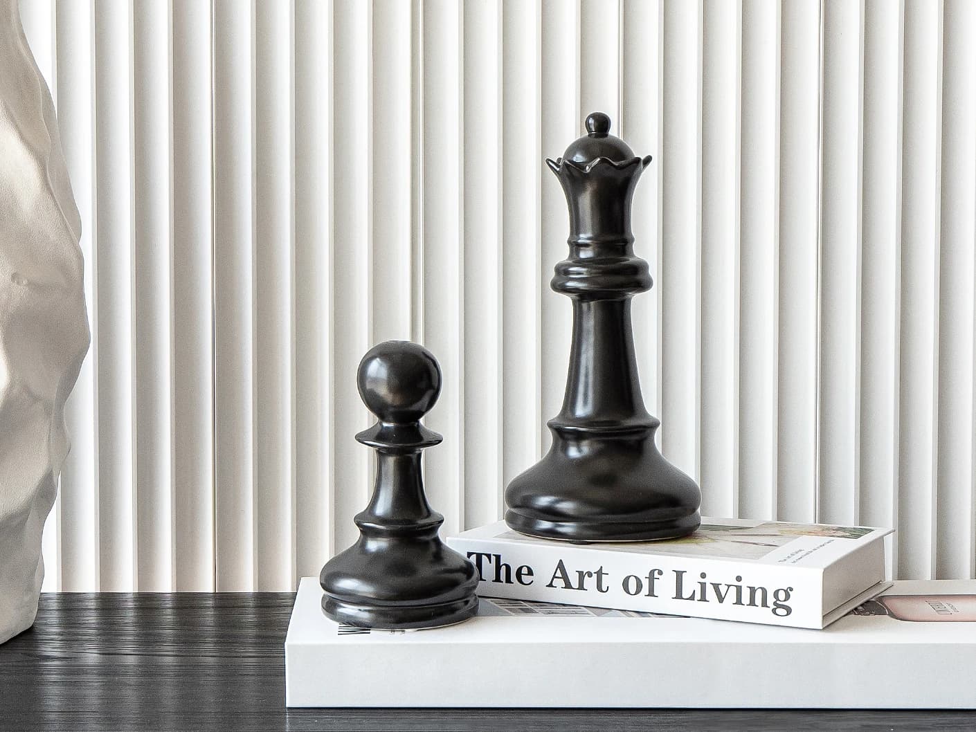 Stefano Arneson statues and sculptures in black, shown in a lifestyle front view