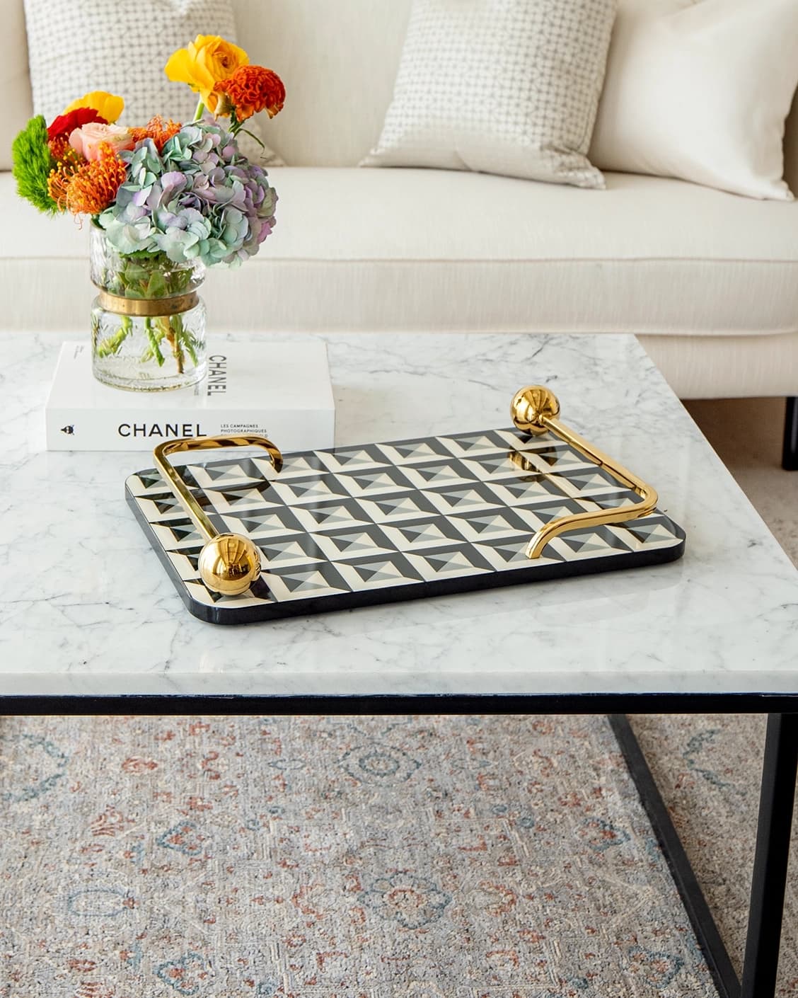 Stephen Bandiagara trays in black and gold, shown in a lifestyle front view