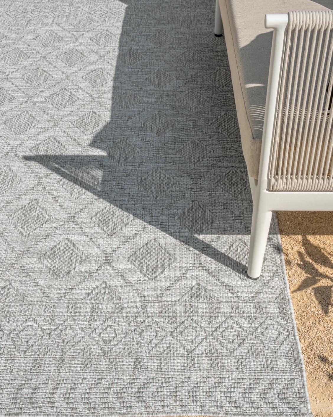 Summer Ashton carpet in grey, shown in a lifestyle top view as image 13