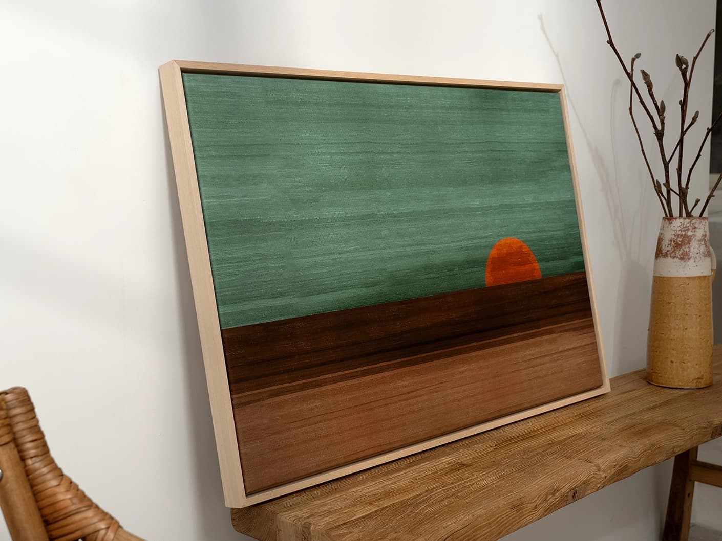 Sunset canvas in green, shown in a lifestyle left view as image 1