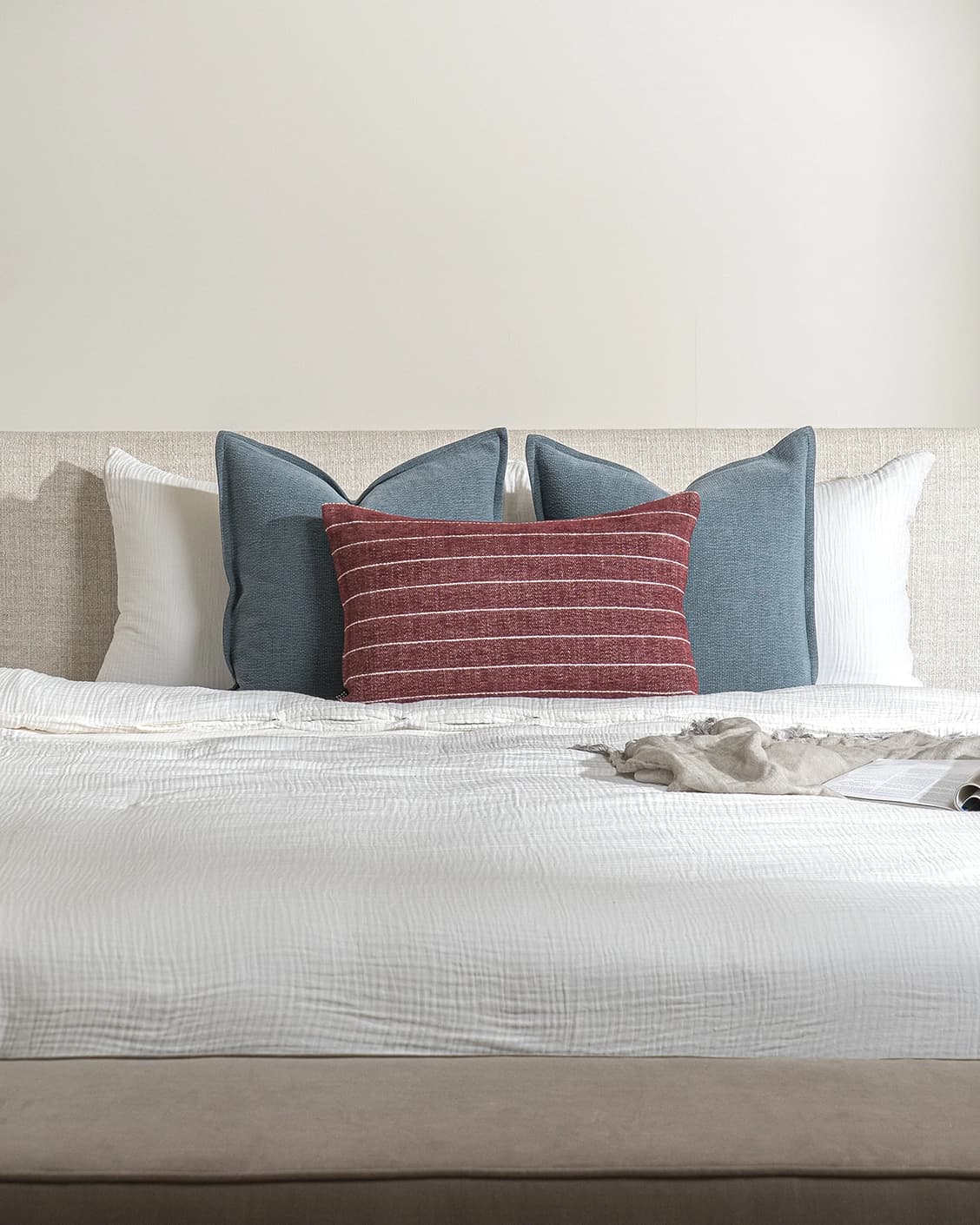 Syed Bundle cushion in blue and red, shown in a lifestyle front view as image 2