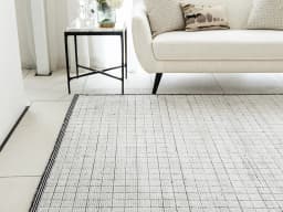 Taylor Bianca carpet in black and white, shown in a lifestyle front view