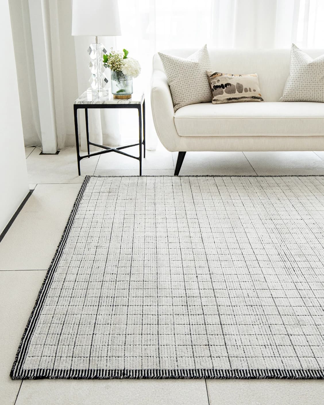 Taylor Bianca carpet in black and white, shown in a lifestyle front view as image 4
