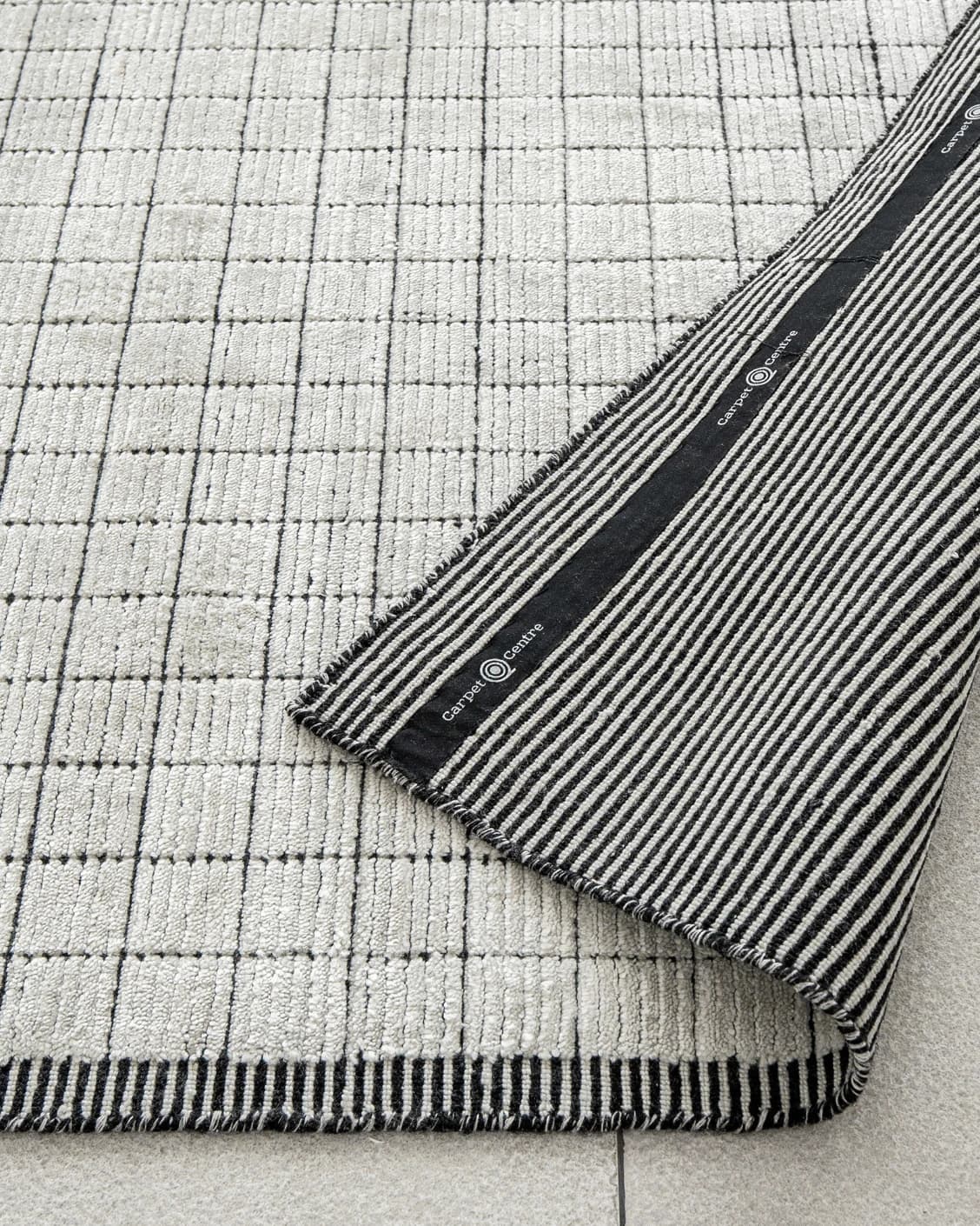 Taylor Bianca carpet in black and white, shown in a product close-up as image 8