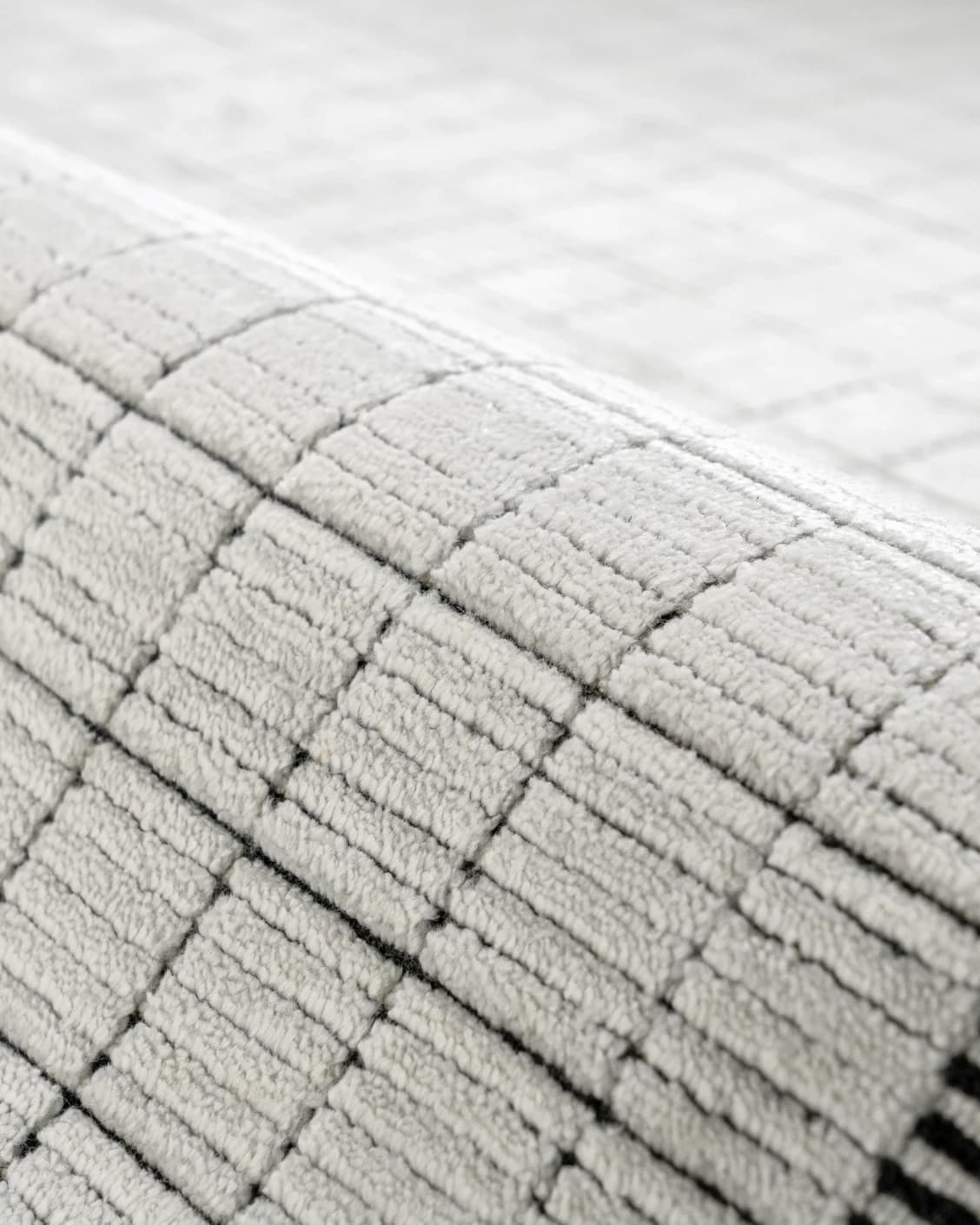 Taylor Bianca carpet in black and white, shown in a product close-up as image 12