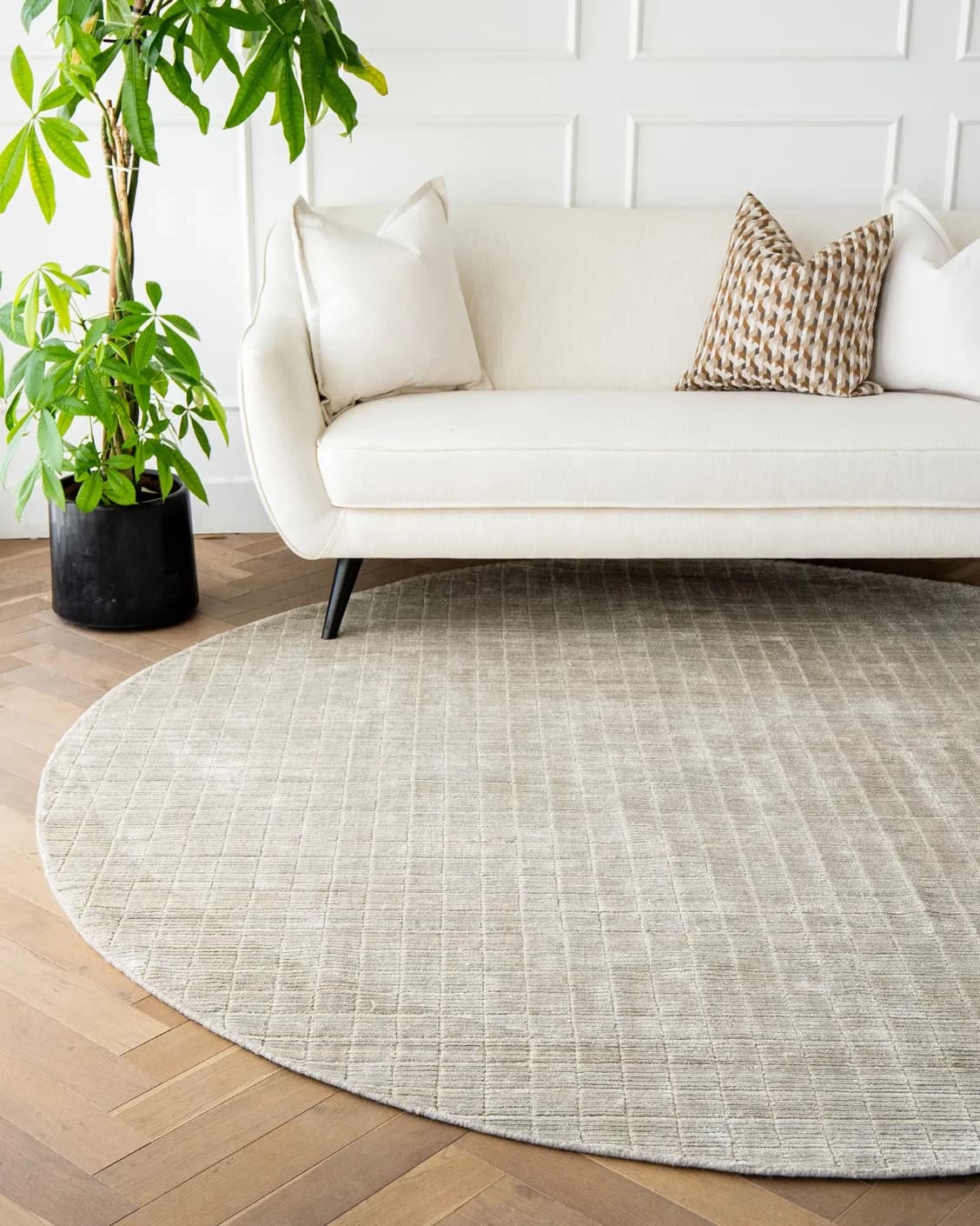 Taylor Dune Round carpet in dune and taupe, shown in a lifestyle front view as image 2