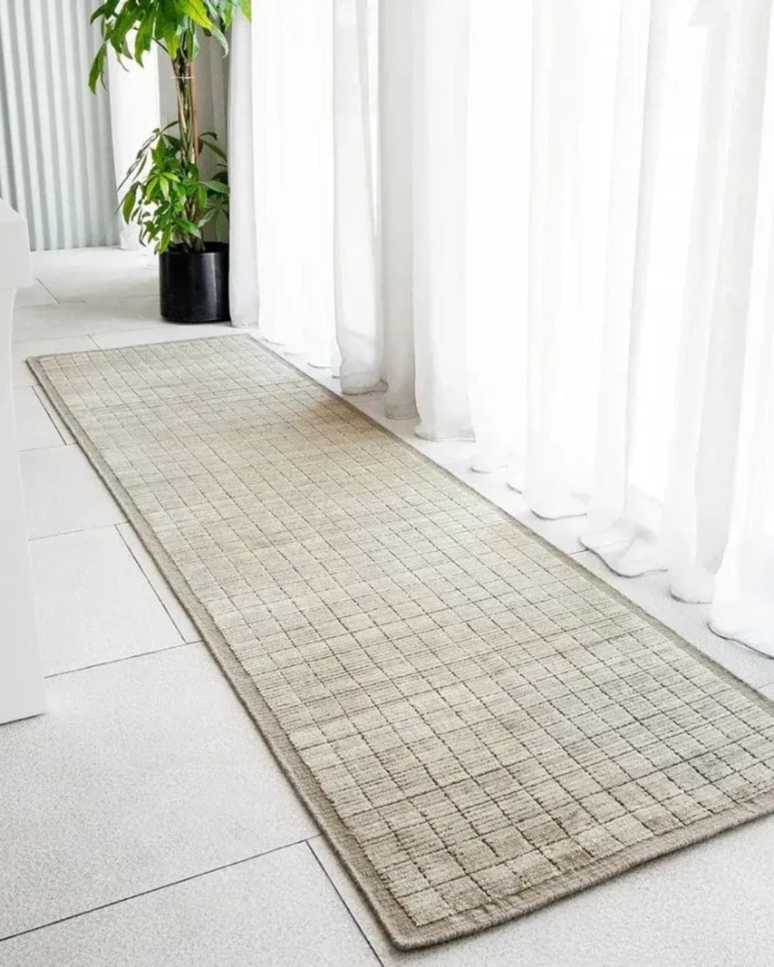 Taylor Dune Runners carpet in taupe, shown in a lifestyle front view as image 2