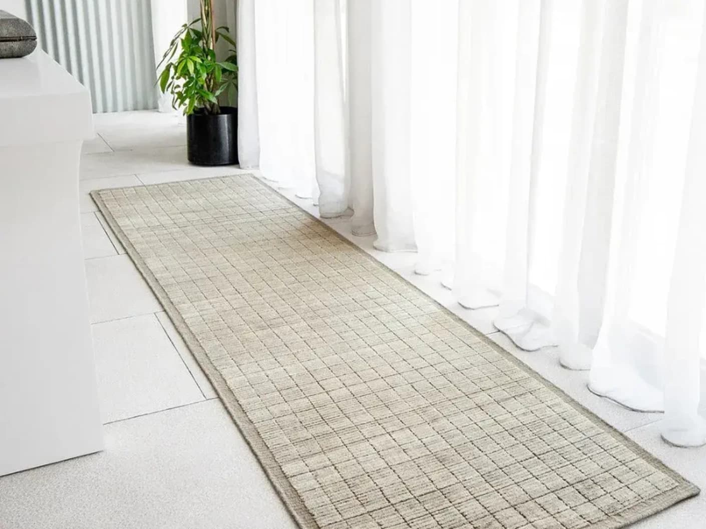 Taylor Dune Runners carpet in taupe, shown in a lifestyle front view