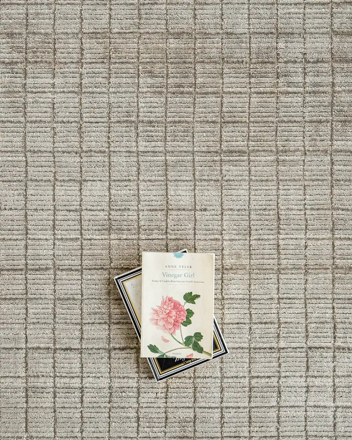 Taylor Dune carpet in taupe, shown in a lifestyle top view as image 6