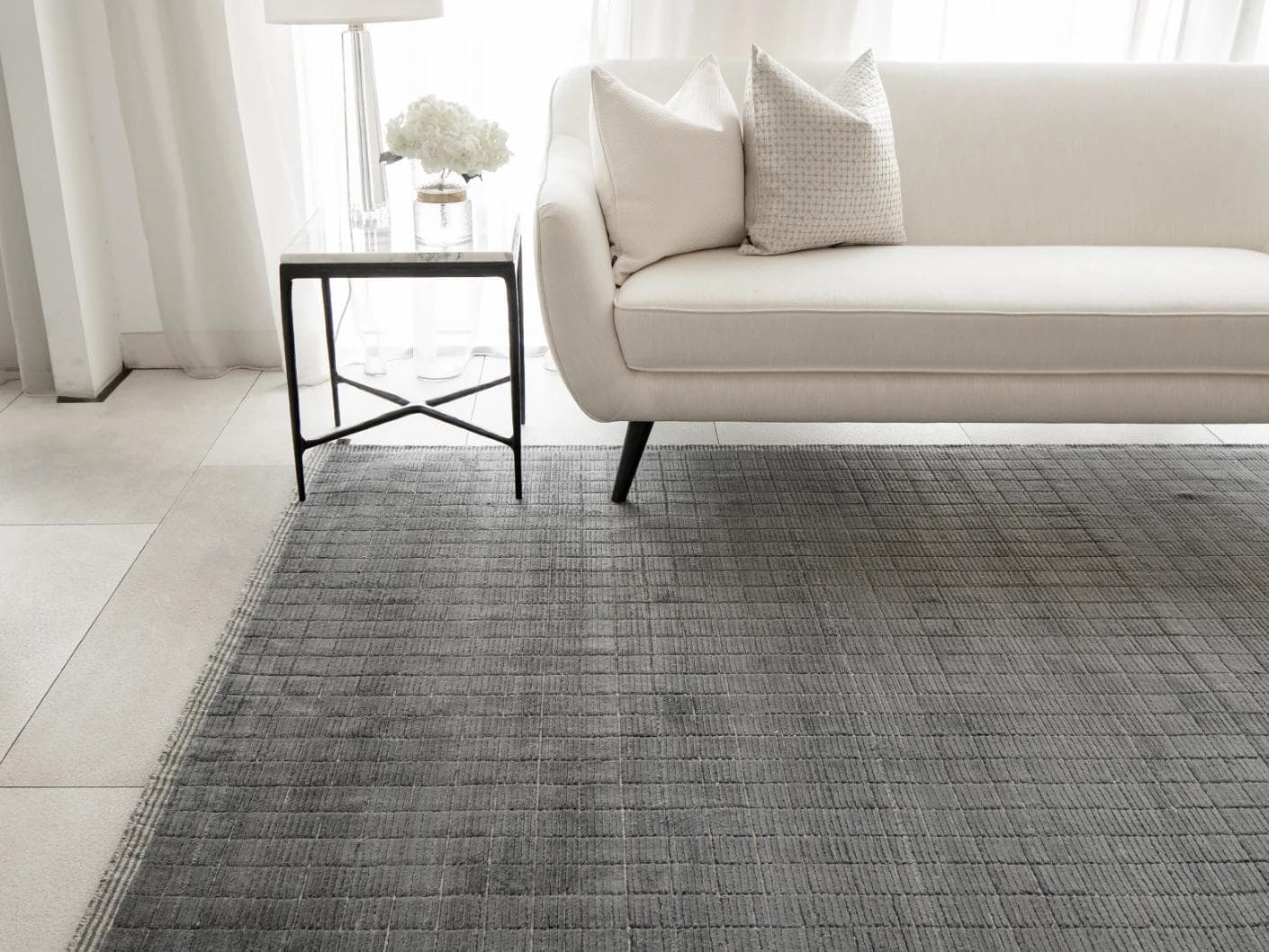 Taylor Ebony carpets in black and grey, shown in a lifestyle front view as image 2
