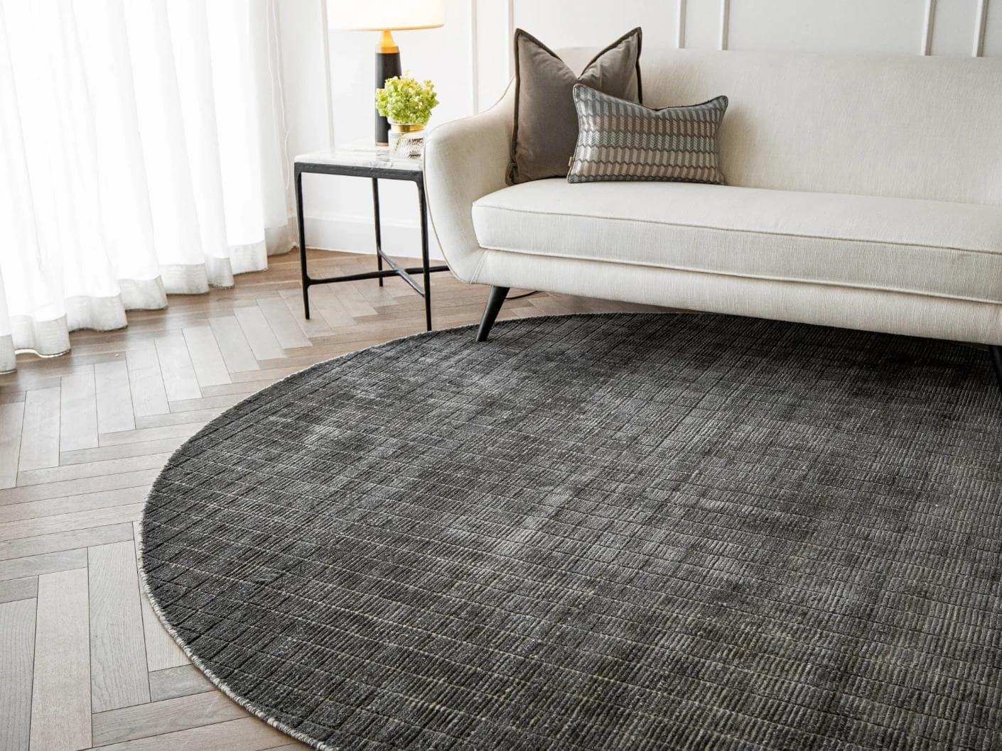 Taylor Ebony carpets in black and grey, shown in a lifestyle front view as image 3