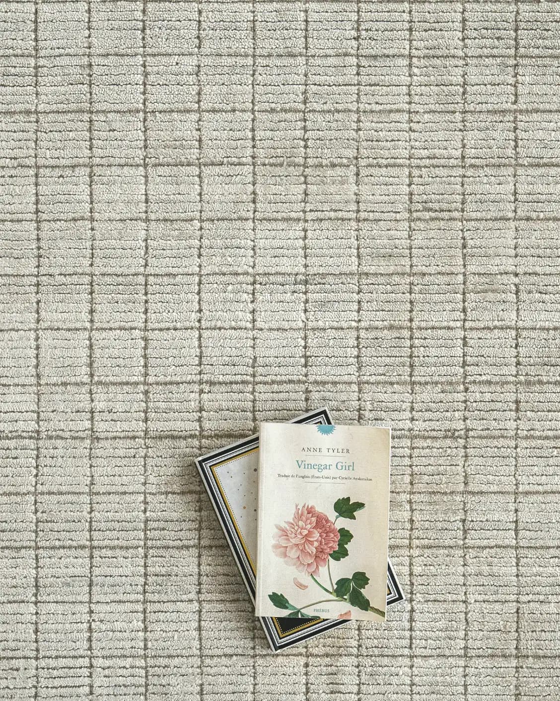 Taylor Sandy carpet in beige, shown in a lifestyle top view as image 6