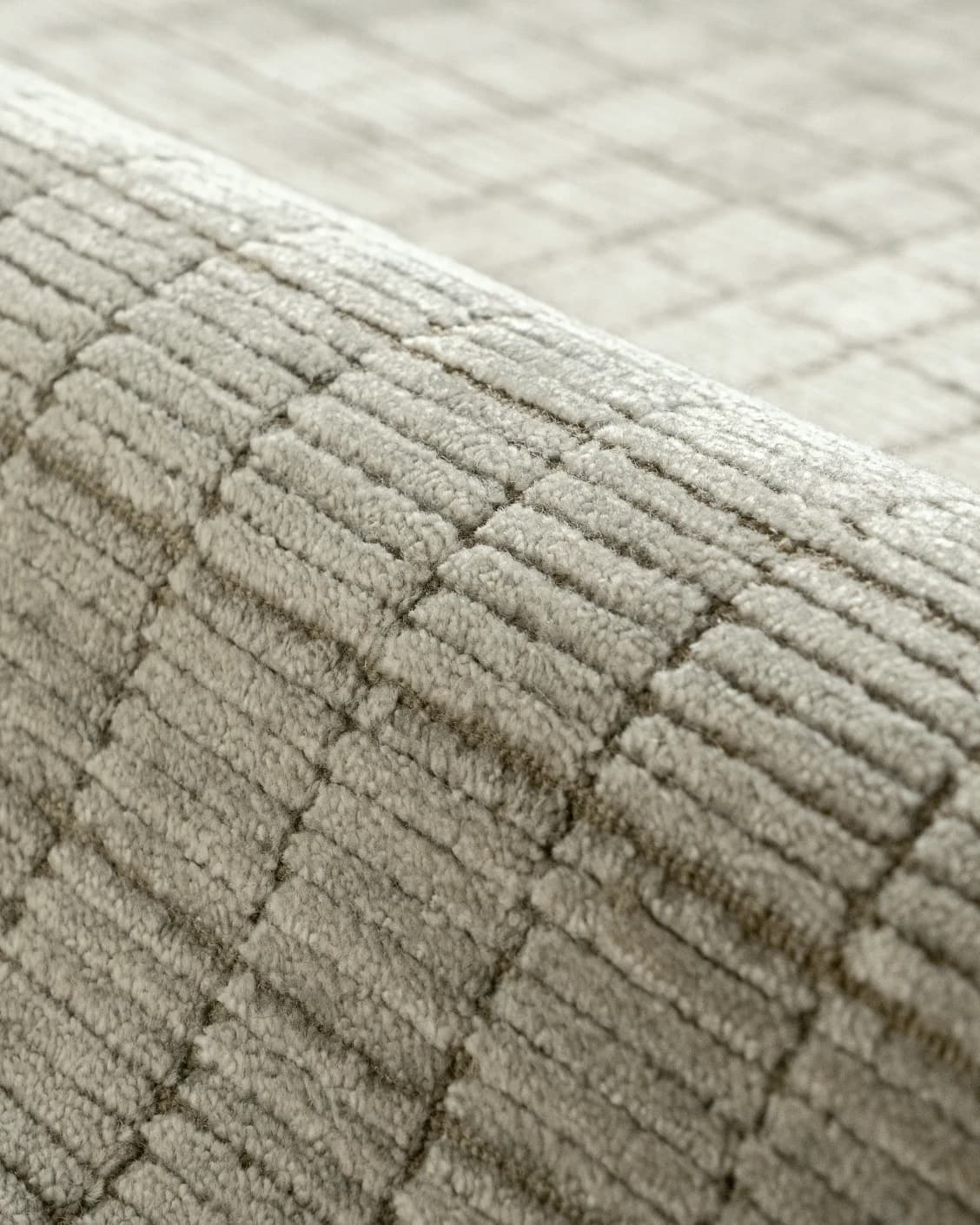 Taylor Sandy carpet in beige, shown in a product close-up as image 10