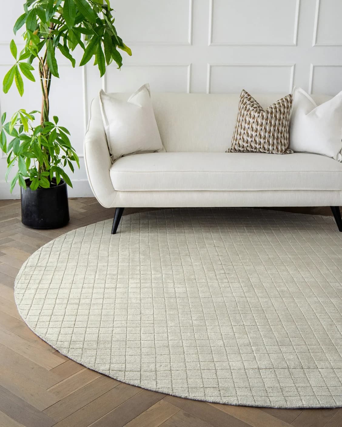 Taylor Sandy Round carpet in sandy and beige, shown in a lifestyle front view as image 2