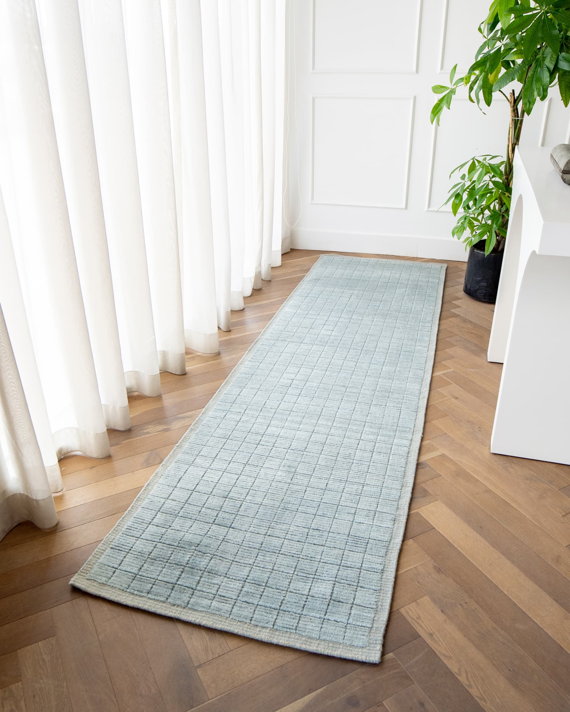 Taylor Sky Runners carpet in sky, shown in a lifestyle front view as image 2