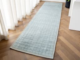 Taylor Sky Runners carpet in sky, shown in a lifestyle front view