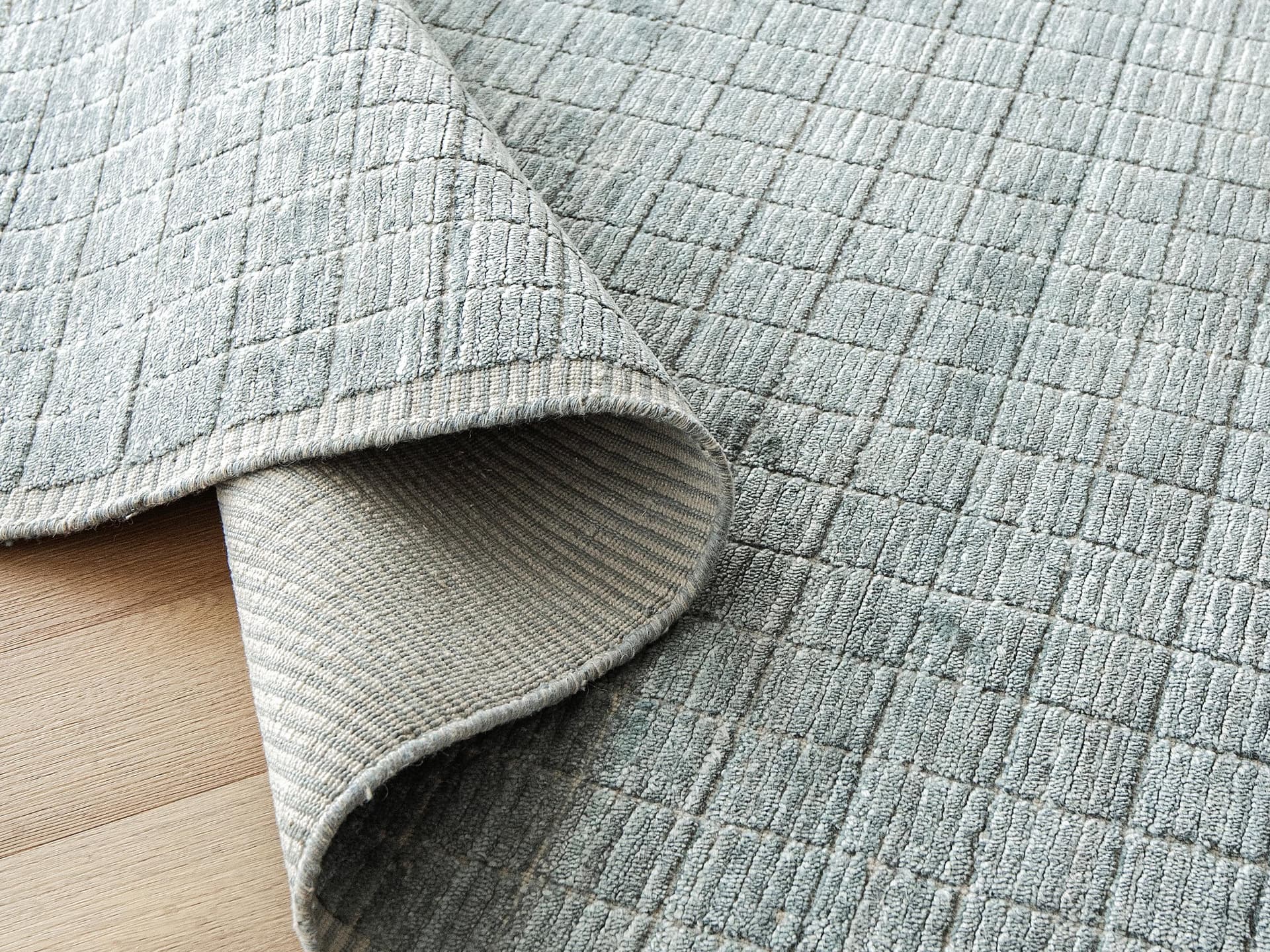 Taylor Sky Runners carpets in sky, shown in a lifestyle top view as image 1