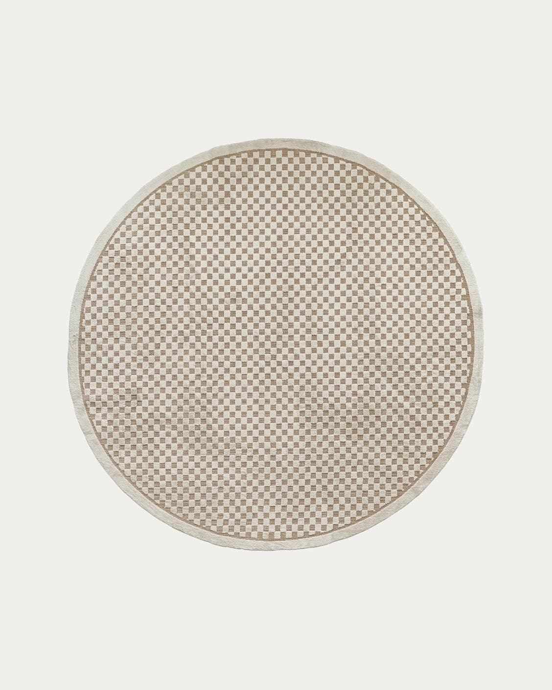 Milo Sandy Round carpet in beige, shown in a product top view as image 1