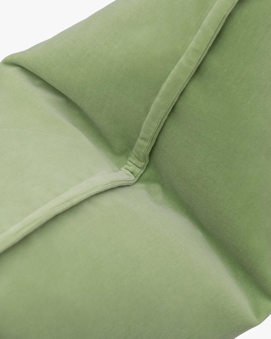 Alessandra Pistachio cushion in green, shown in a product top view as image 9