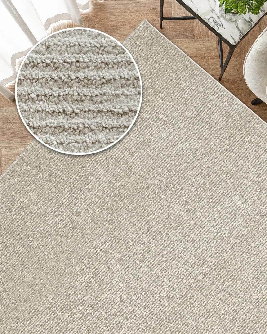 Rik Sandy carpet in beige, shown in a lifestyle top view as image 2