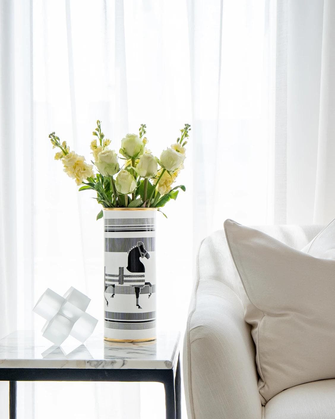 Aurora Arneson vases in white and black, shown in a lifestyle front view as image 6