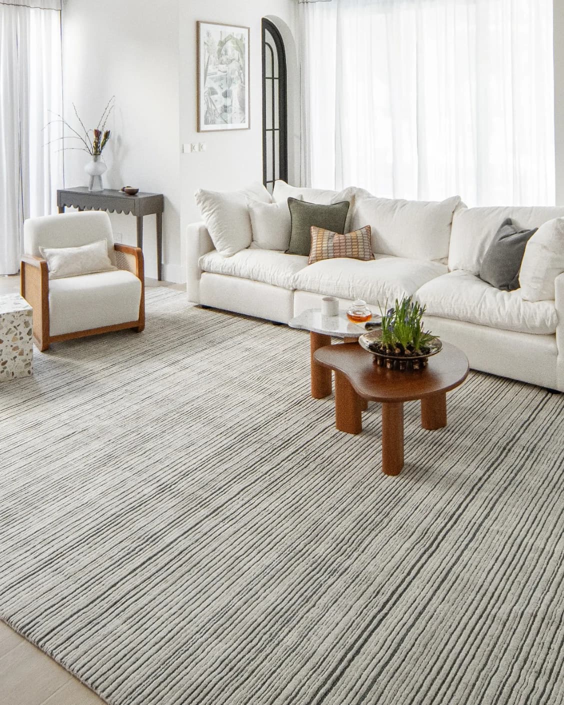 Theodore Ashton carpet in grey and ivory, shown in a lifestyle right view as image 8