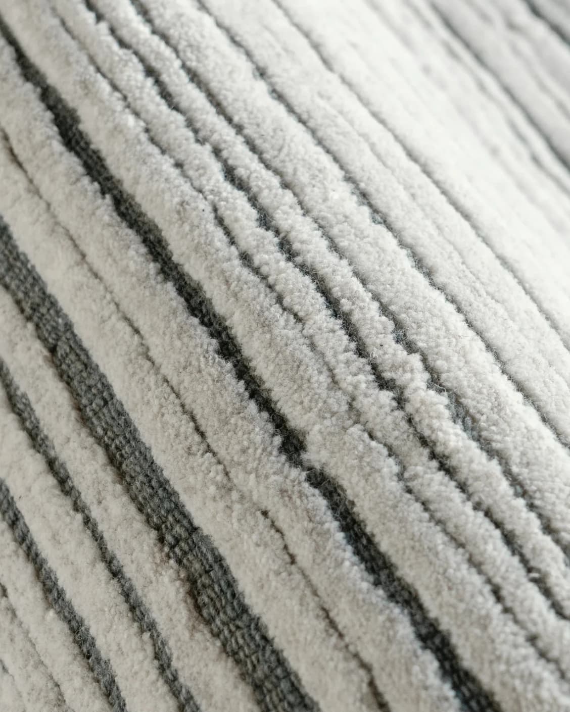 Theodore Ashton carpet in grey and ivory, shown in a product close-up as image 10