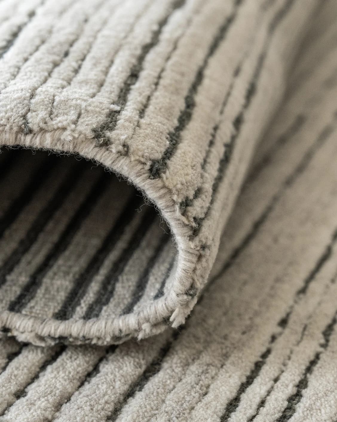 Theodore Ashton carpet in grey and ivory, shown in a product close-up as image 13