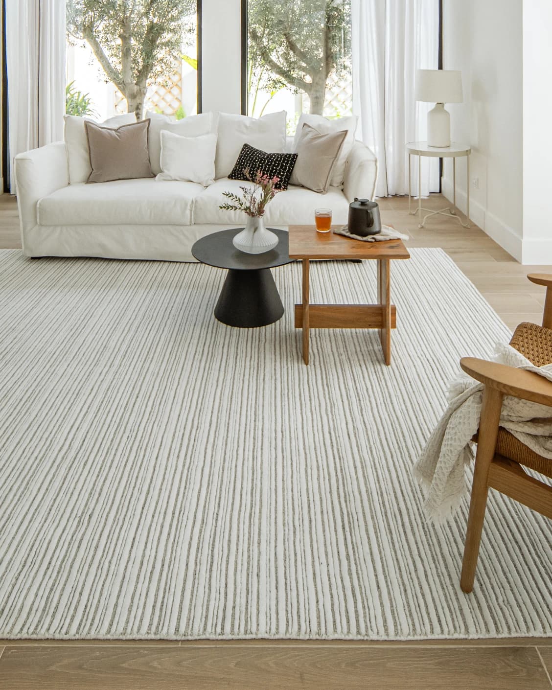 Theodore Dune carpet in dune, grey and white, shown in a lifestyle front view as image 6