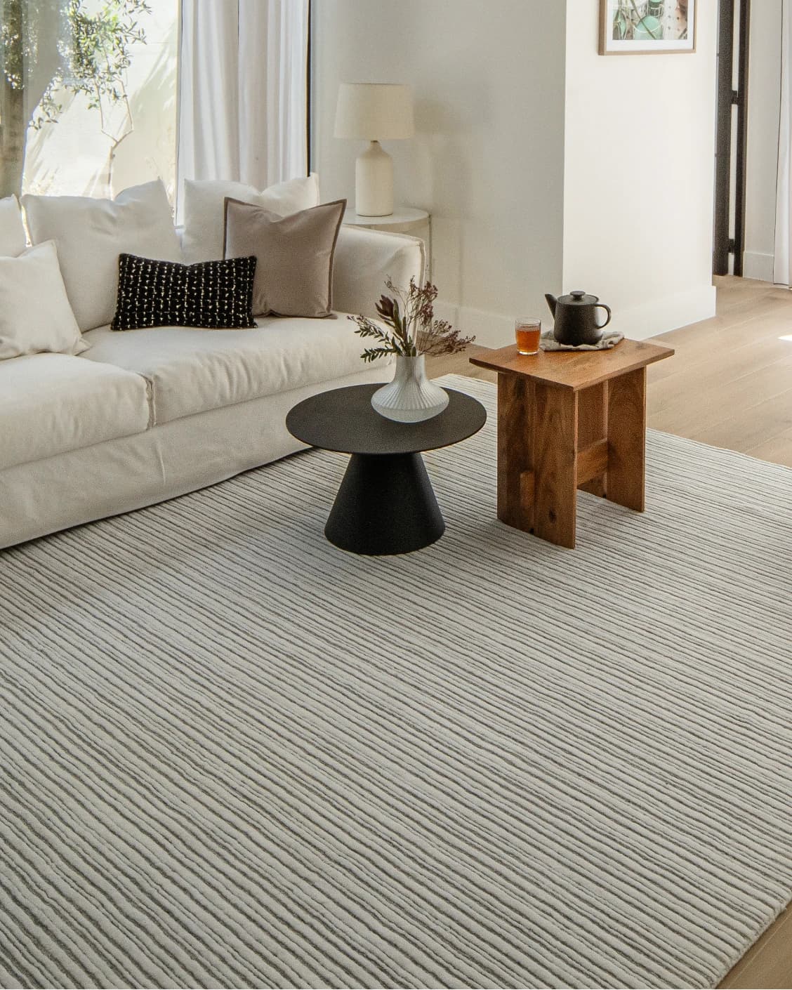Theodore Dune carpet in dune, grey and white, shown in a lifestyle left view as image 8