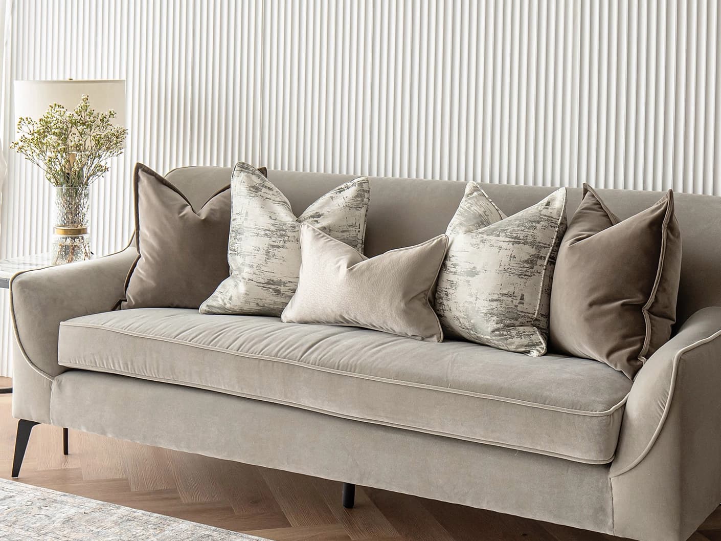 Timmy Bundle bundle cushions in gold, brown, beige, grey and white, shown in a lifestyle front view