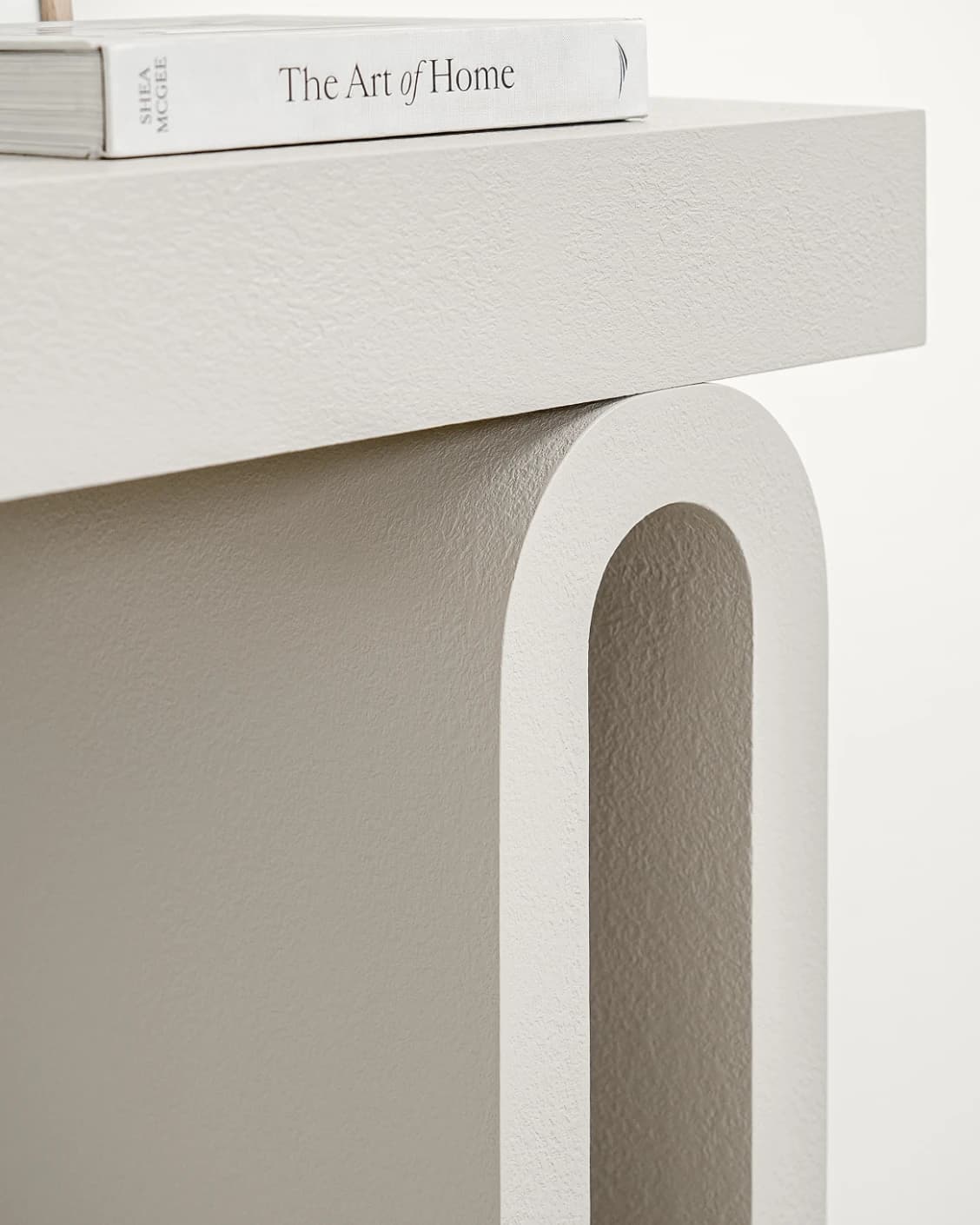 Trento Console Table Soft Ivory Stone console table in soft ivory and stone, shown in a lifestyle close-up as image 4