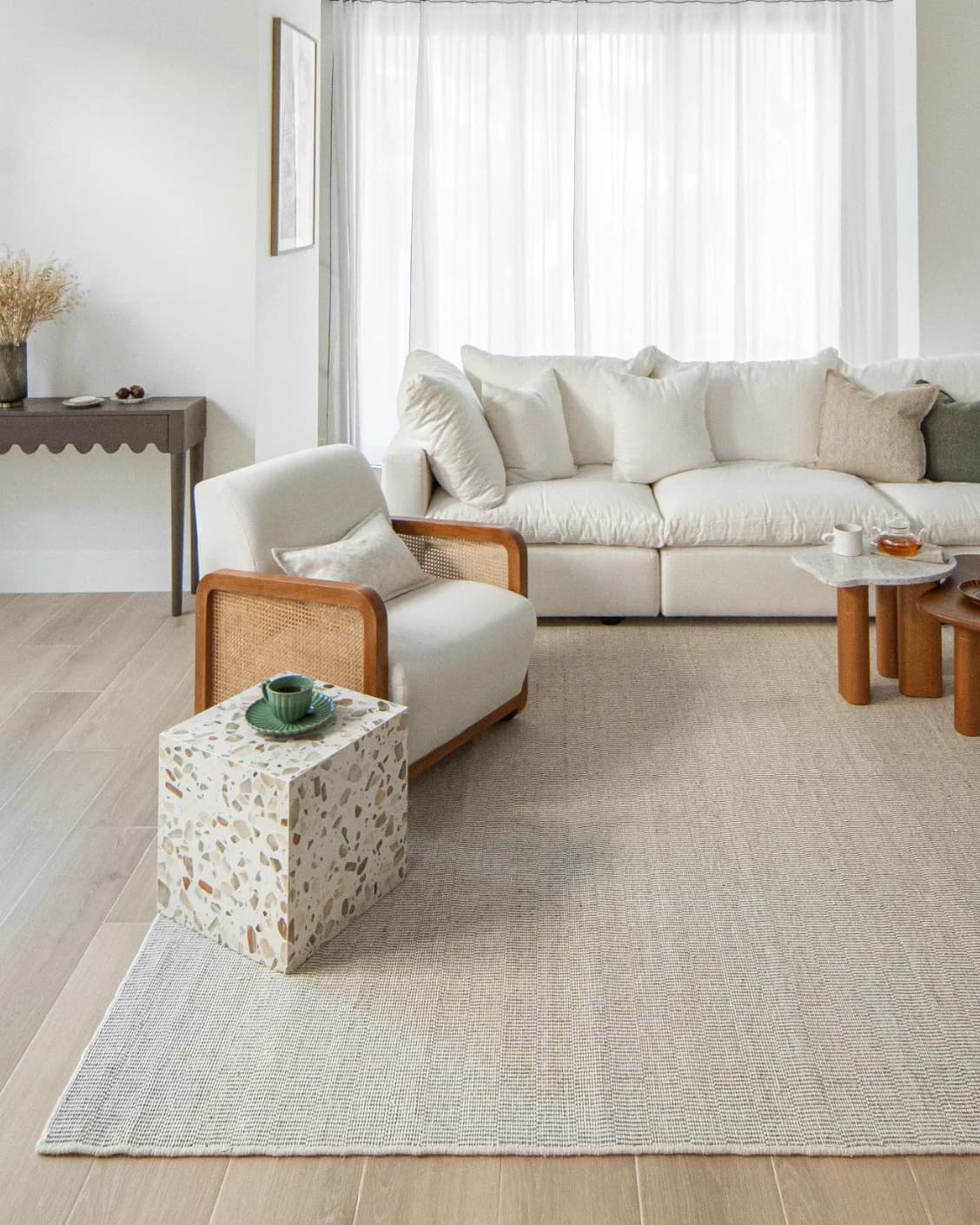 Treva Stone carpet in stone, beige and taupe, shown in a lifestyle front view as image 5