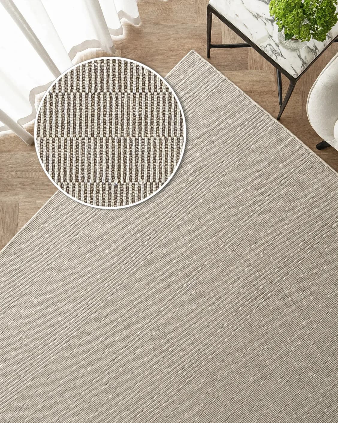 Treva Stone carpet in stone, beige and taupe, shown in a lifestyle top view as image 2