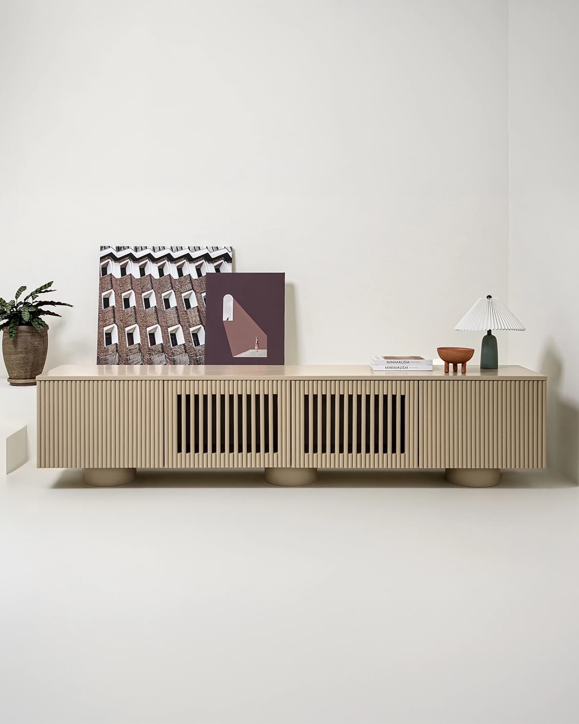 Treviso TV unit in warm clay and taupe, shown in a lifestyle front view as image 2