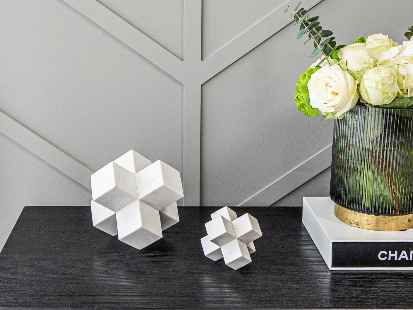 Turing Ellis statues and sculptures in white, shown in a lifestyle front view