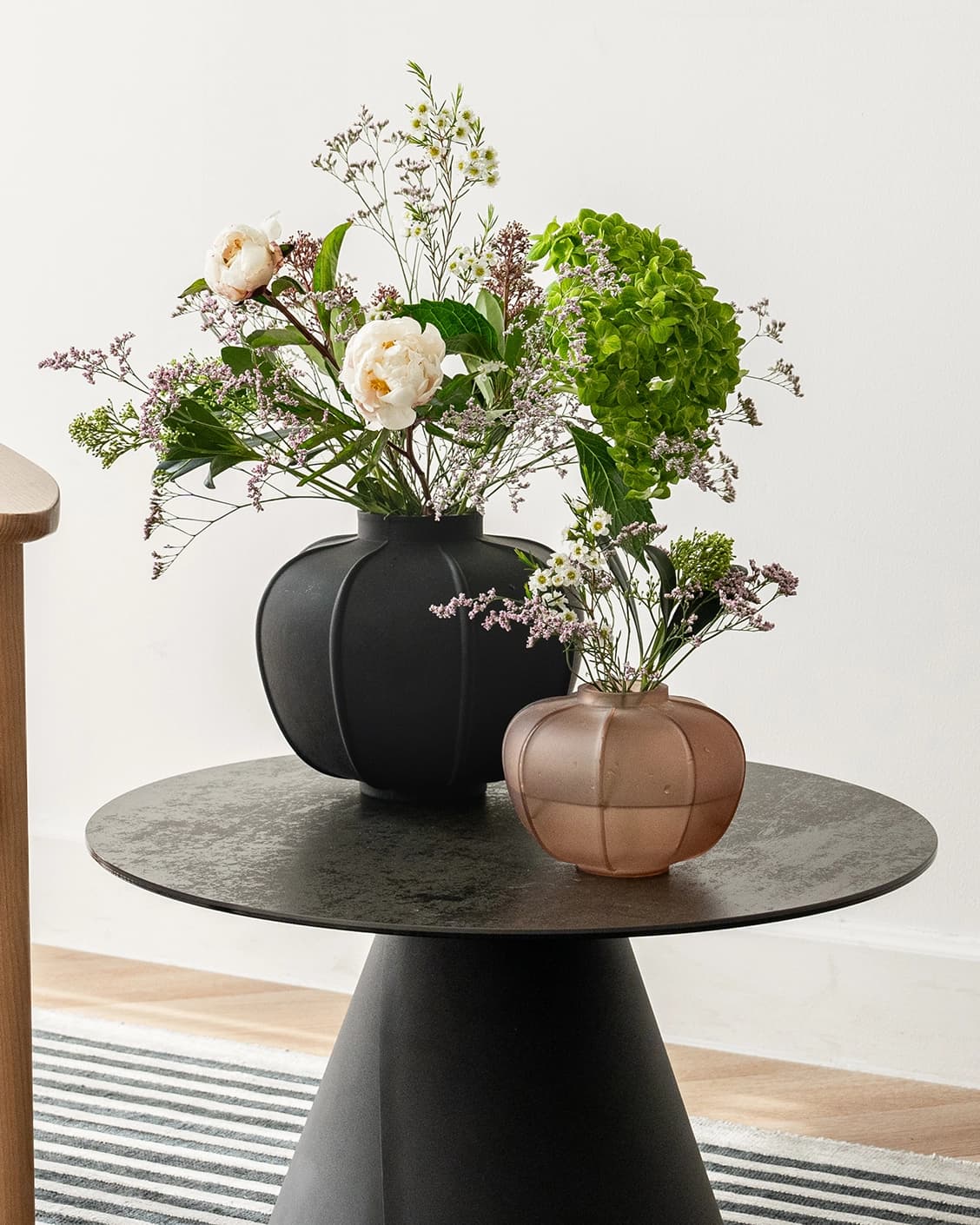 Valeria Storms Bundle vases in black, shown in a lifestyle right view