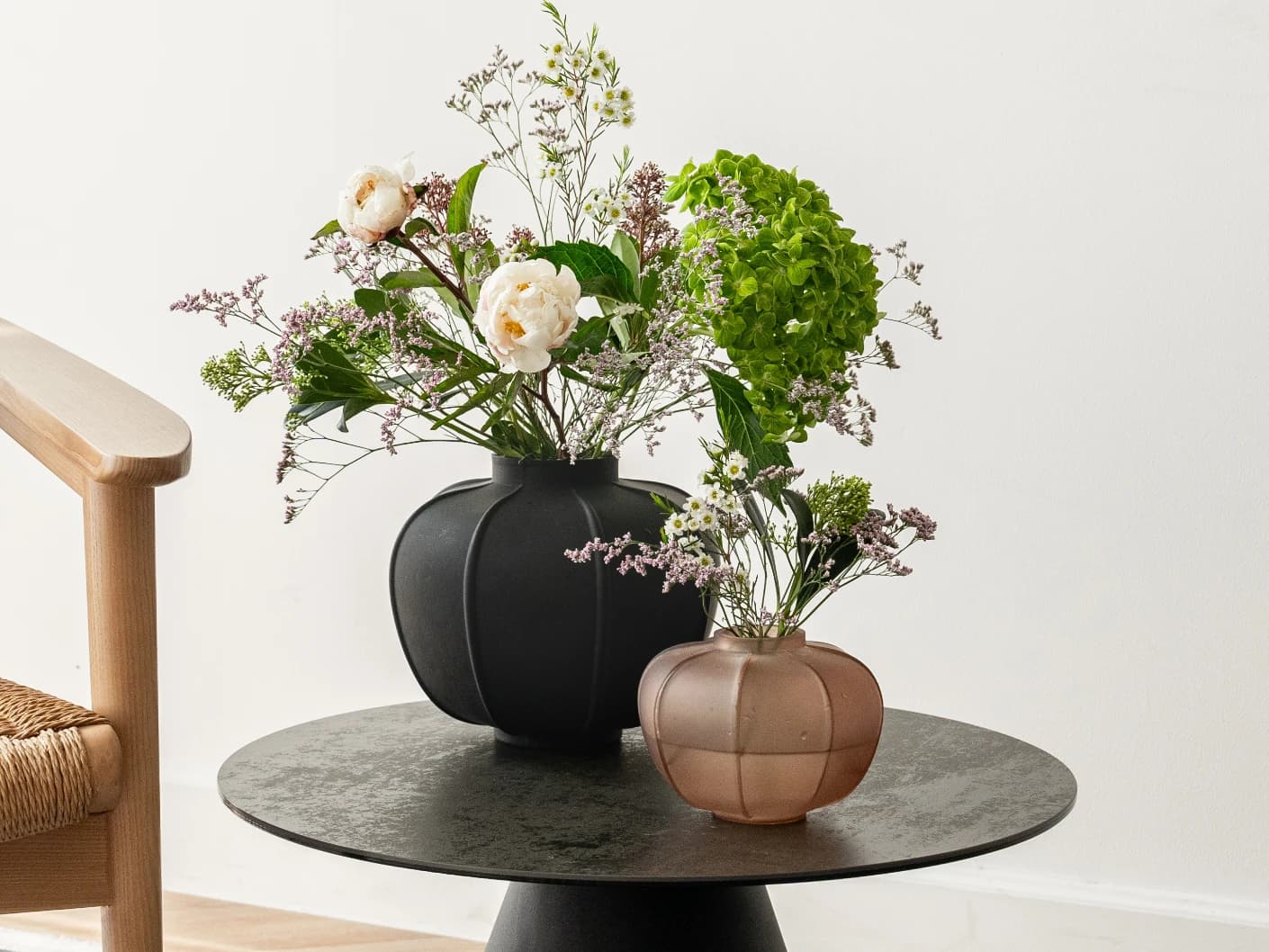 Valeria Storms Bundle vases in black, shown in a lifestyle right view