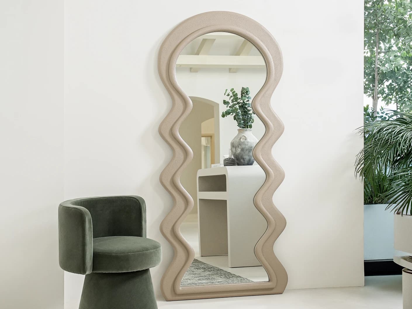 Vasta mirror, shown in a lifestyle front view