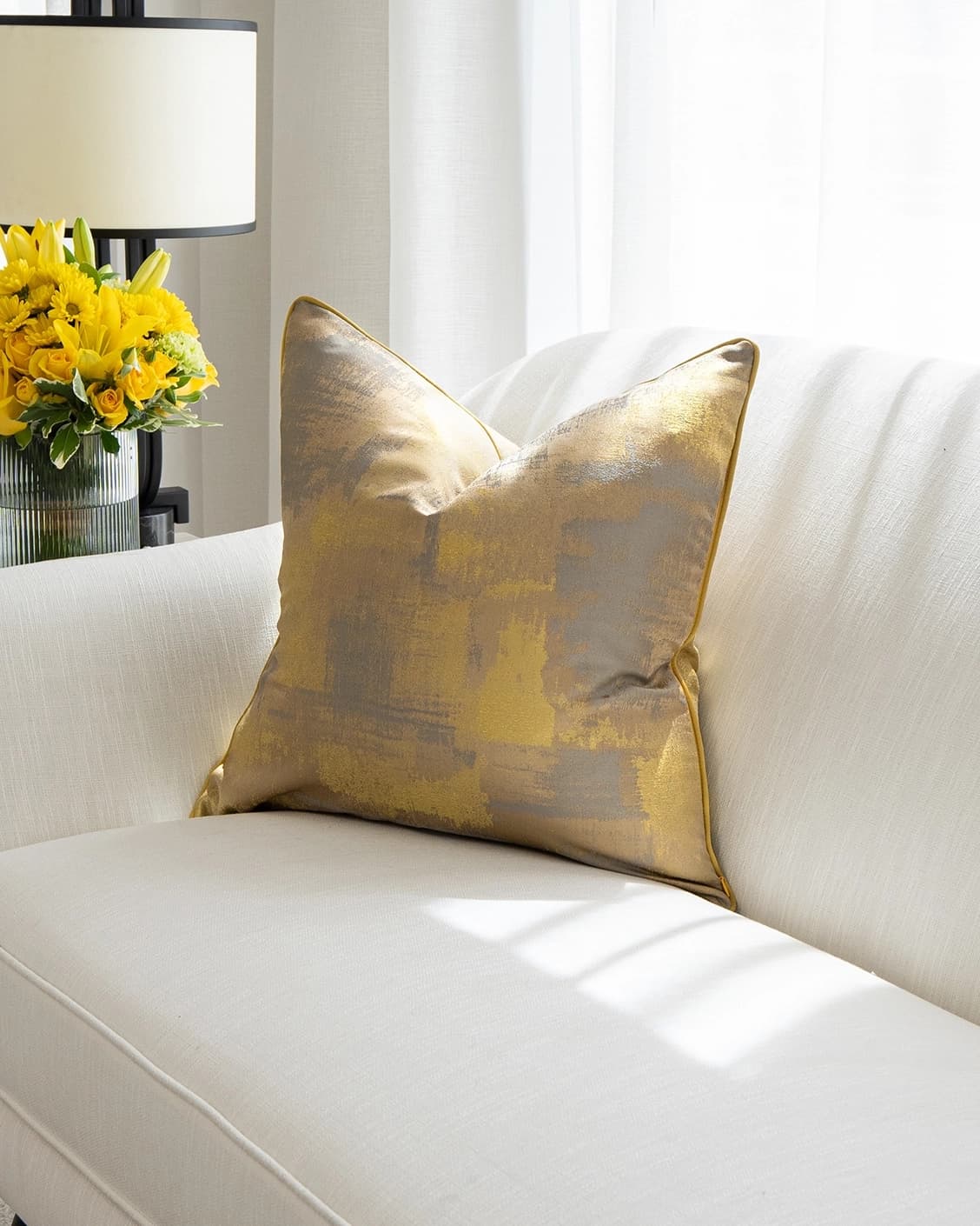 Venus Klimt cushion in yellow, shown in a lifestyle front view as image 2