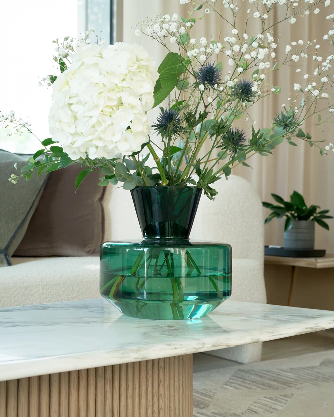 Verdell Storms vases in green, shown in a lifestyle front view as image 2