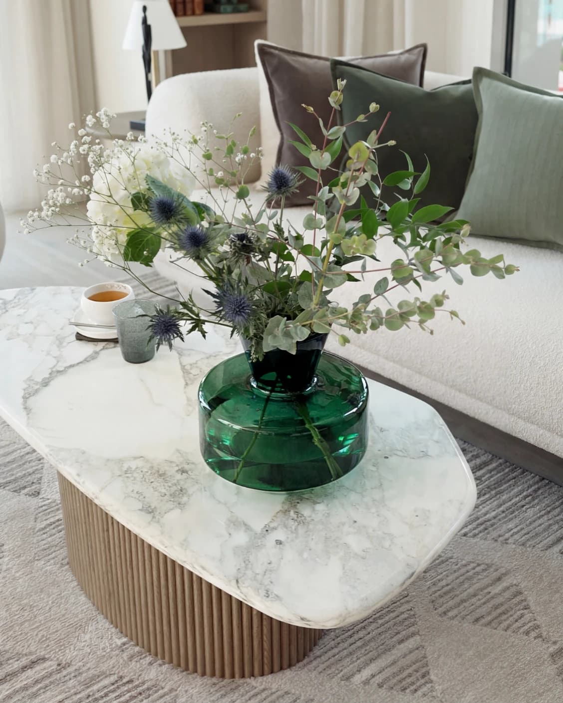 Verdell Storms vases in green, shown in a lifestyle top view as image 9