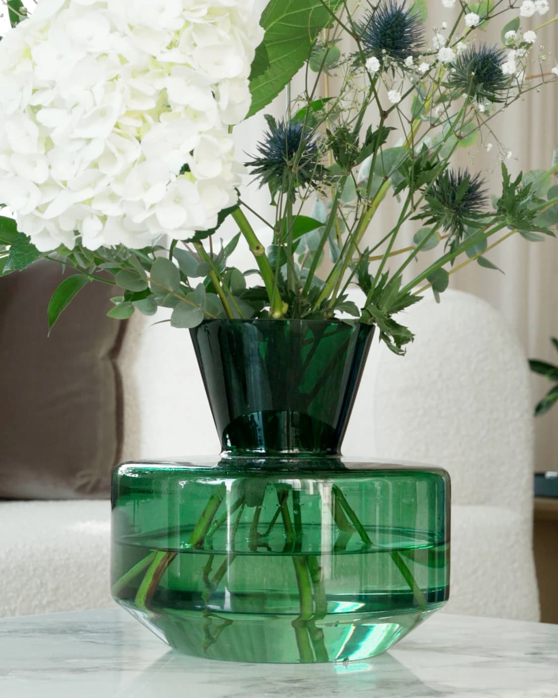 Verdell Storms vases in green, shown in a lifestyle front view as image 2